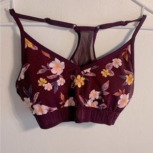 PINK Victoria Secret dark purple sports bra with multicolor floral design